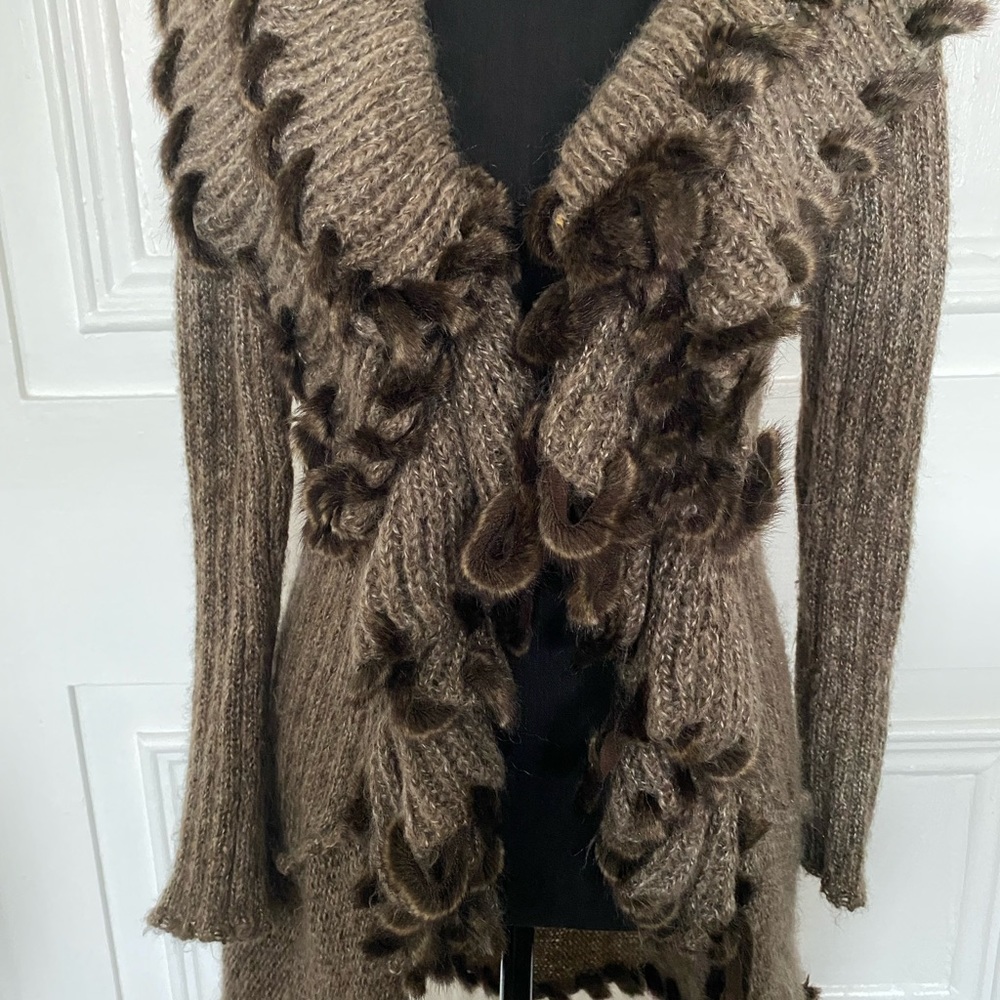 A throw on for any weather sweater.